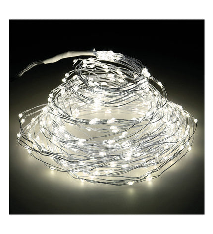 Lumineo silver 5-meter LED fairy light garland with warm white bulbs, perfect for outdoor garden decoration.