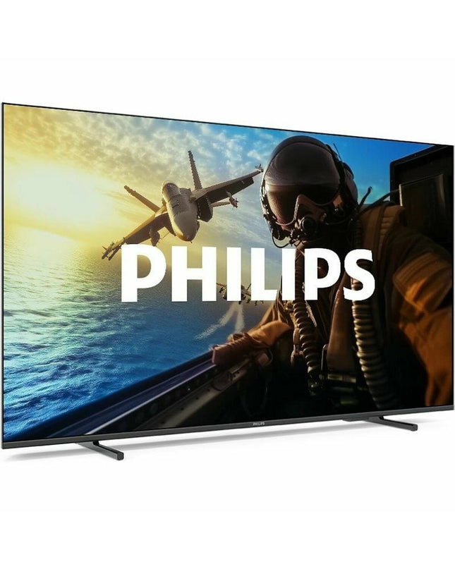 Philips 50PUS7000 50-inch 4K Ultra HD LED Smart TV with HDR, showing a vibrant home entertainment scene.