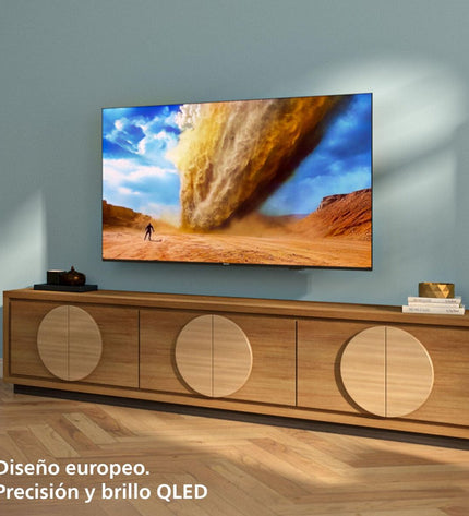 Philips 43-inch 4K Ultra HD LED QLED Smart TV with HDR, sleek black screen and slim bezel for home entertainment.