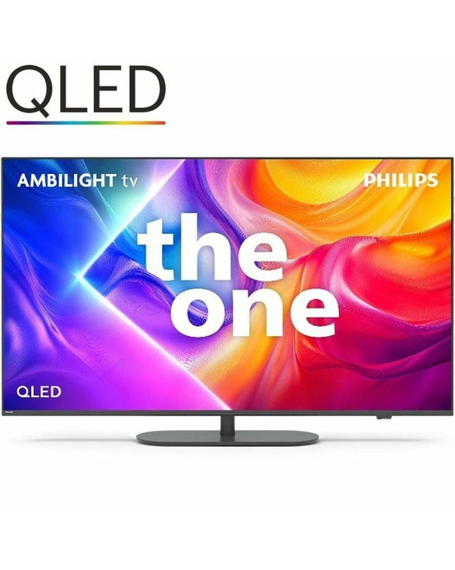 Philips 55-inch 4K Ultra HD LED QLED Smart TV displaying vibrant HDR visuals in a modern living room setup.