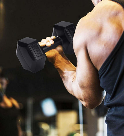 Black XQ Max dumbbells for fitness and outdoor workouts, featuring a sleek design for strength training exercises.