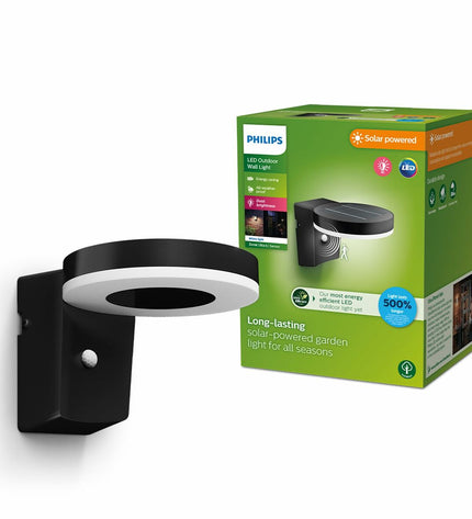 Philips outdoor garden wandlamp with 1.3W power, 250 lumens, circular design, warm 3000K light for outdoor decor.