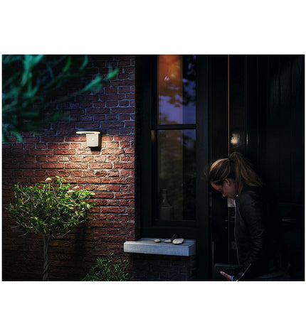 Philips outdoor garden wall lamp with 1.3W, 250 lumens, circular design, 3000K warm white light for exterior decor