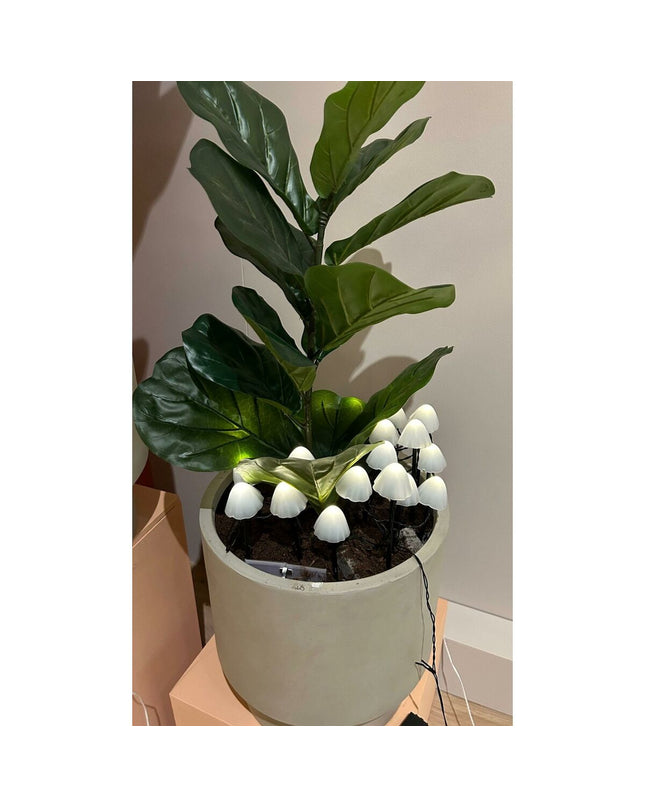 Set of 20 Lumineo decorative outdoor plant lights featuring white mini mushroom-shaped lanterns for garden decoration.