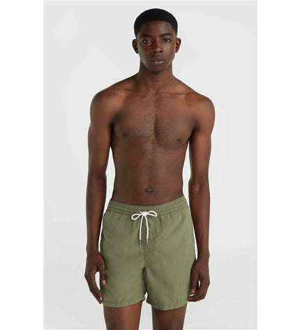 Dark green O'Neill men's swim trunks, Vert 16-inch, suitable for watersport and outdoor activities, shown on a model.