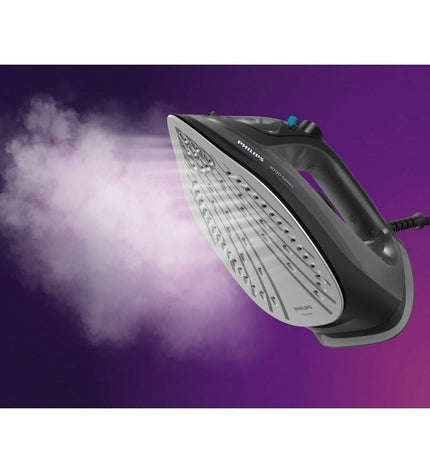 Philips DST3041/80 steam iron with digital display and ergonomic handle, ready for home ironing tasks.