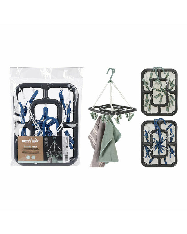 Redcliffs foldable clothes drying rack hanging on a wall, ideal for home laundry and storage organization.