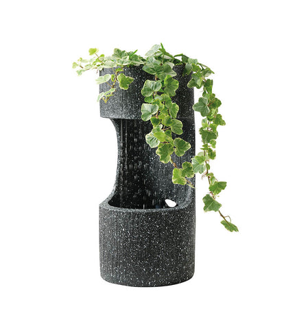 Lifetime Tuinfontein Lifetime Waterbron with cylindrical outdoor garden decoration featuring a concrete finish and decorative water feature.