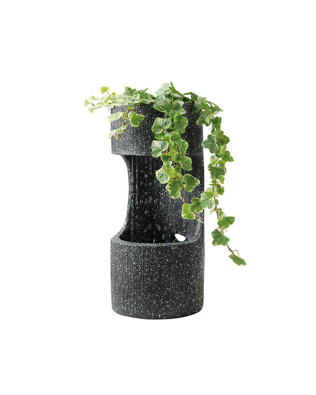 Lifetime Tuinfontein Lifetime Waterbron with cylindrical outdoor garden decoration featuring a concrete finish and decorative water feature.