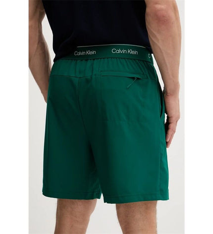 Calvin Klein herenzwembroek in groen, woven sport en outdoor watersport swimshorts, front view with drawstring waistband.