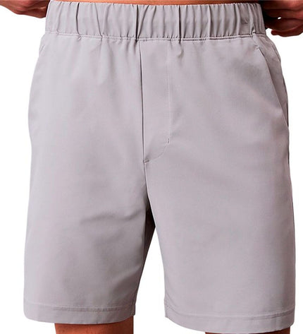 Calvin Klein herenzwembroek in grijze woven design, suitable for sport en watersport, shown on a flat surface with elastic waistband