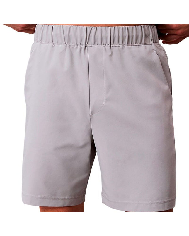 Calvin Klein herenzwembroek in grijze woven design, suitable for sport en watersport, shown on a flat surface with elastic waistband