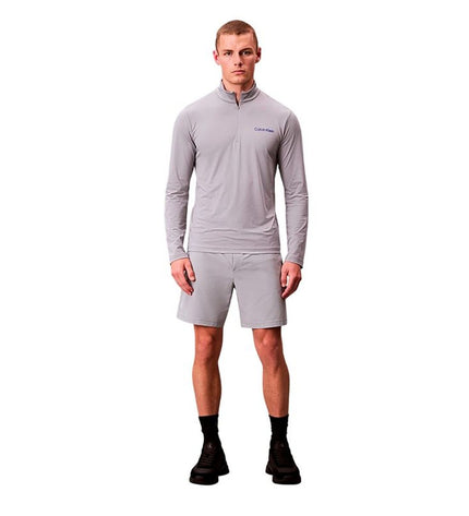 Calvin Klein men's woven gray swim shorts for sports and watersport activities, soft fabric with sporty design.