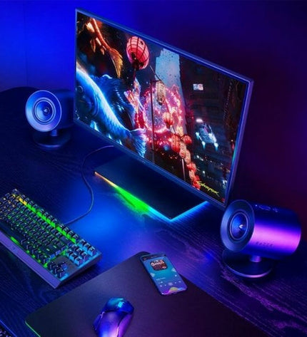 Razer Bluetooth portable speaker for gaming, compact design with controls, connected via Bluetooth, suitable for plug & play gaming consoles