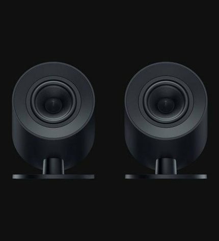 Razer Bluetooth portable speaker for gaming and music, compact electronic device with sleek black design and control buttons.