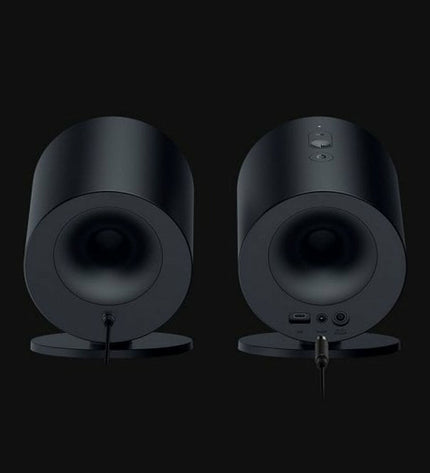 Portable Razer Bluetooth speaker for gaming and electronics, compact design with controls visible on the black speaker.