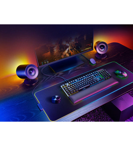 Razer gaming keyboard and plug-and-play gaming mouse on a desk, black electronics accessories for consoles and gaming setup