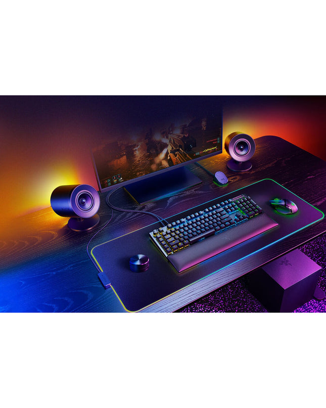 Razer gaming keyboard and plug-and-play gaming mouse on a desk, black electronics accessories for consoles and gaming setup