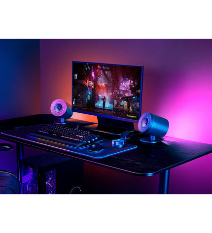 Razer gaming keyboard and plug-and-play gaming mouse with illuminated keys and ergonomic design for electronic gaming consoles.