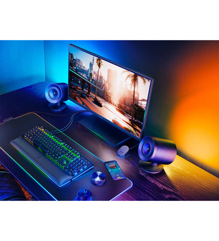 Razer gaming keyboard and mouse set with black keys and sleek design, ideal for electronic gaming consoles.