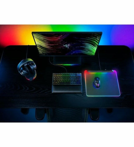 Razer Firefly V2 Pro gaming mouse pad with LED lighting, featuring a smooth surface for optimal gameplay on electronic gaming consoles.