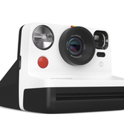 Polaroid instant camera in black with lens and viewfinder, compact size 11.2 x 9.4 x 15 cm, for photography and instant prints.
