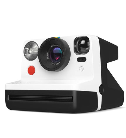 Polaroid instant camera in black with lens and viewfinder, compact electronic photography device on a white background.