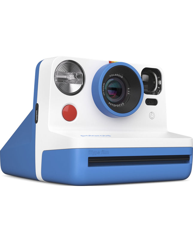 Polaroid instant camera in blue with dimensions 11.2 x 9.4 x 15 cm, showcasing its compact design and vintage camera features.