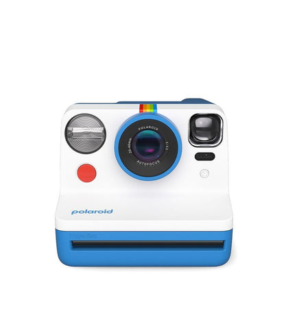 Polaroid Instant Fotocamera in blauw with compact size, showing front view with lens and flash, perfect for instant photos.