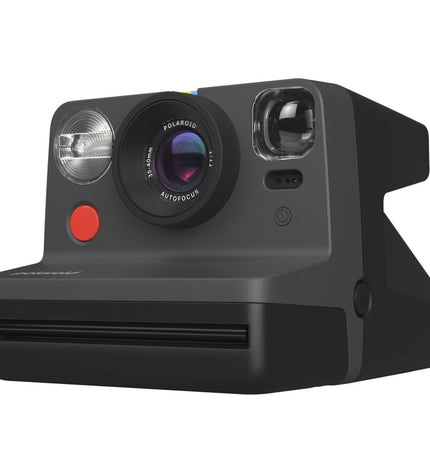 Polaroid Instant Fotocamera 009095 in black with viewfinder, buttons, and lens, ideal for instant photos and creative photography.
