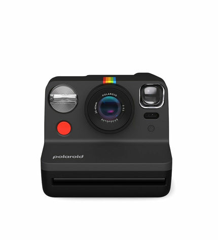 Polaroid Instant Fotocamera 009095 in white with lens, shutter button, and viewfinder for instant photography.