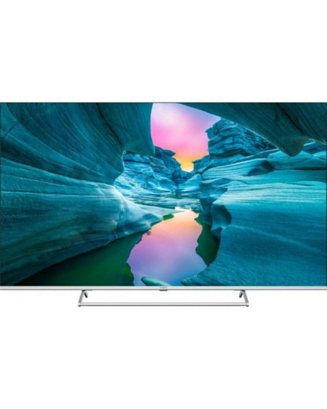Strong SRT65UG8773C 65-inch 4K Ultra HD HDR QLED Smart TV displaying vibrant picture with sleek black frame.