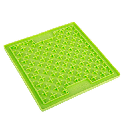 Green TPR dog lick mat in a dog bowl for dogs, from Lickimat, designed for interactive feeding and soothing canine comfort.