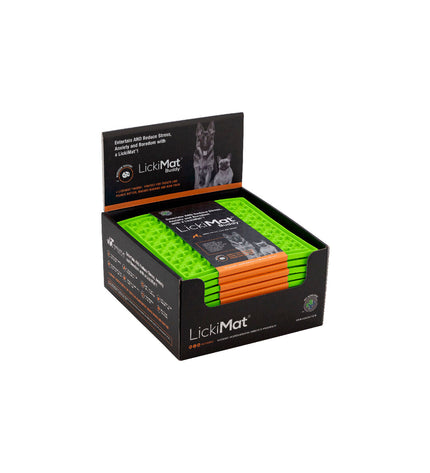 Green Lickimat dog feeding tray made of TPR, designed for dogs to lick and play with.