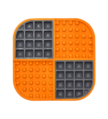 Lickimat Dog Slomo orange dog feeding mat made of polypropylene and TPR for dogs, designed for slow feeding and enrichment.