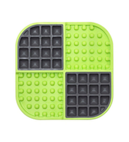 Green Lickimat dog feeding tray made of polypropylene and TPR for dogs, designed to slow feeding and reduce boredom.