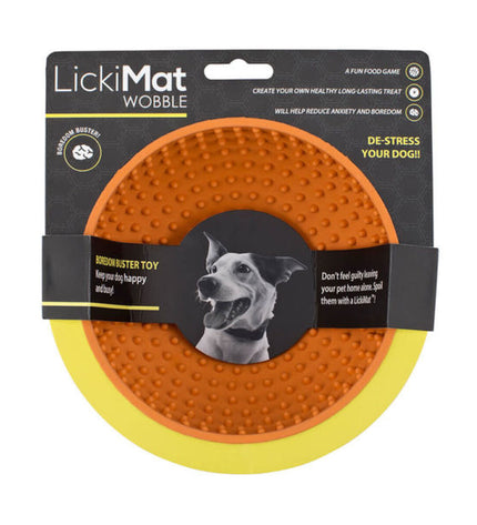 Orange rubber Lickimat wobble dog food bowl for dogs, featuring a textured surface to entertain and slow down feeding.