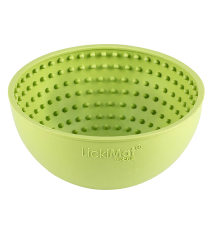 Green rubber Lickimat dog feeding tray with 600 ml capacity, designed for dogs to lick and chew comfortably.