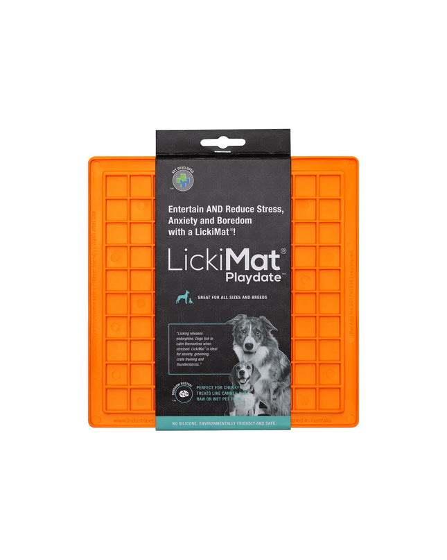 Orange Lickimat dog feeder made of TPR, designed to keep dogs entertained and promote slow eating.