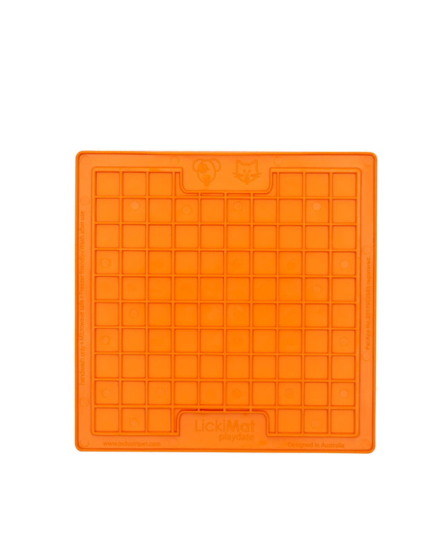 Orange TPR dog lick mat from Lickimat with textured surface, designed for feeding and calming dogs.