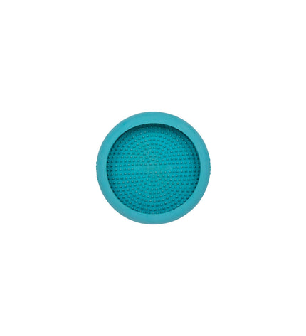 Turquoise rubber dog lick mat in Lickimat brand, designed for dog feeding and enrichment, shown with textured surface.