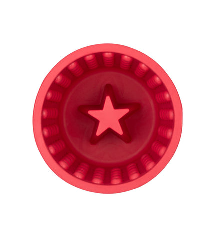 Pink rubber dog lickimat with a textured surface for dogs, designed to keep pets entertained and reduce anxiety.
