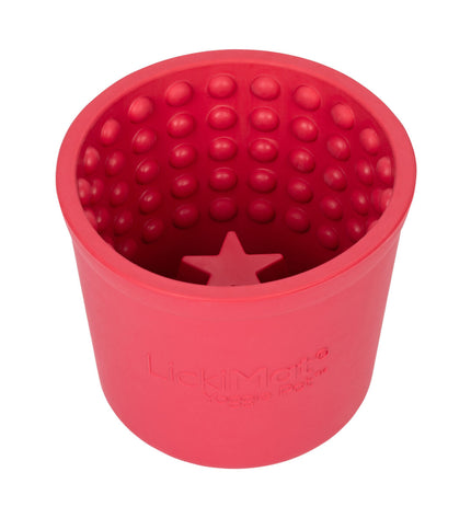 Pink rubber dog lickimat tray designed for dogs, with textured surface for soothing and feeding activities, by Lickimat.