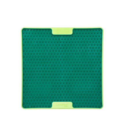 Green Lickimat dog feeding tray made of durable polypropylene and TPR, designed for canine enrichment and feeding.