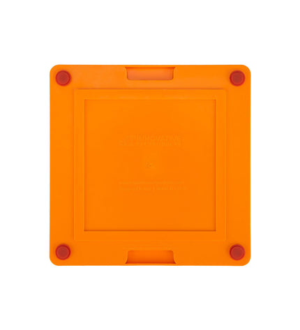 Orange Lickimat dog feeding tray made of durable polypropylene and TPR, designed for interactive dog enrichment and feeding.