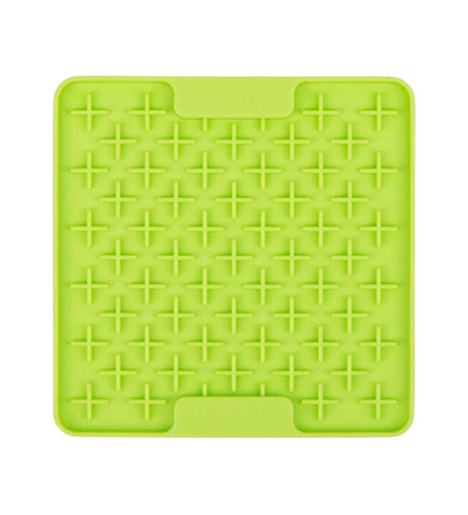 Green TPR dog lick mat from Lickimat with textured surface for calming and interactive feeding for dogs.