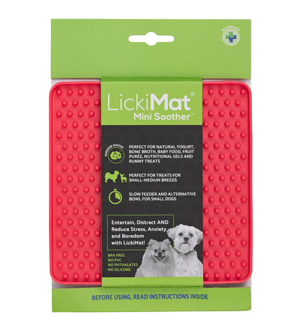 Pink TPR dog lickmat in a dog product image, designed for use with dogs to promote licking and calming.