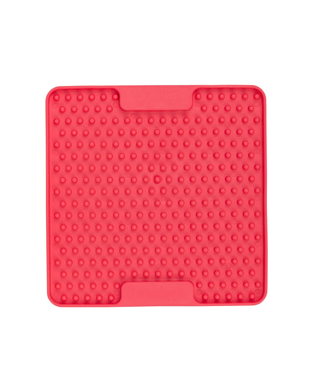 Pink Lickimat dog feeding tray made of TPR, designed for dogs, with a textured surface for interactive feeding.