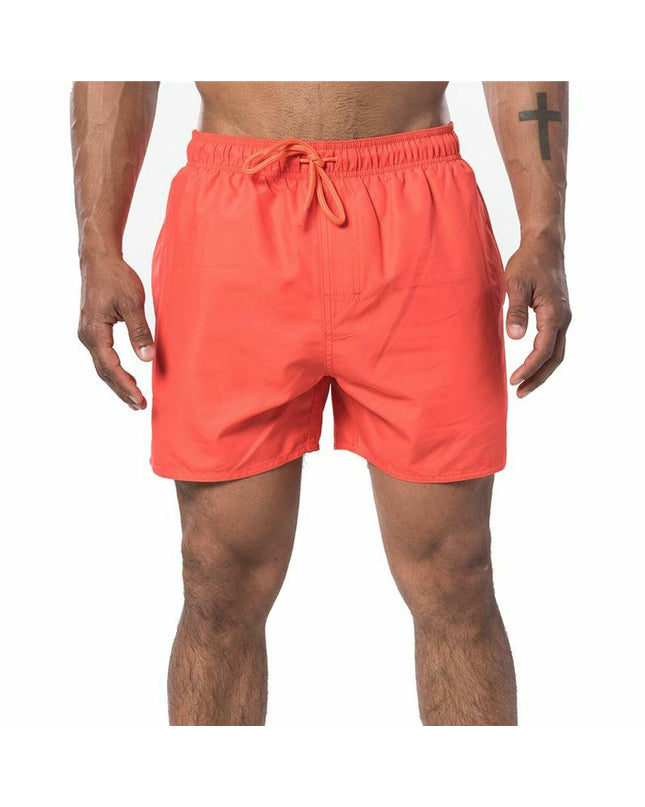 Red Rip Curl men's swim trunks featuring offset volley design, suitable for sport and outdoor water activities.