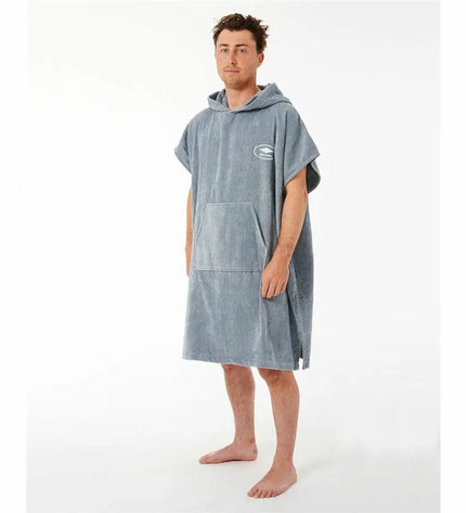 Blue Rip Curl hooded poncho towel with logo, ideal for watersport and outdoor activities, showing the fabric and hood details.
